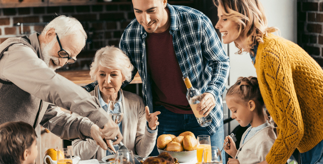 Holiday dinner with hard of hearing individuals enjoying the celebration in a supportive environment.