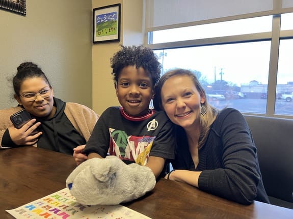 Pediatric hearing patient receiving care at the Hearing Center at West Texas Rehab to improve hearing and communication skills.