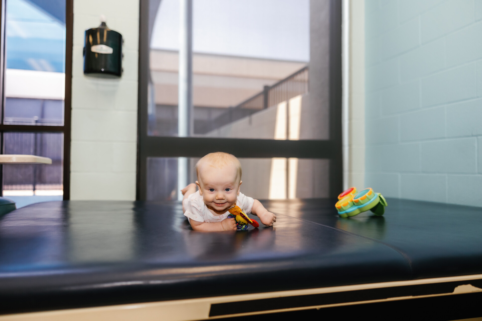 Baby receiving specialized therapy at West Texas Rehab to support development.