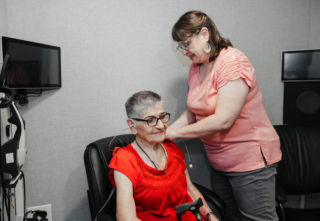 Hearing patient undergoing a hearing test at West Texas Rehab for auditory evaluation.