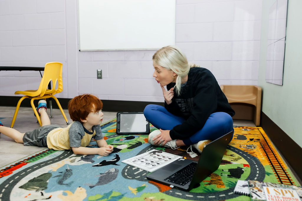 Pediatric speech therapy patient practicing sounds at West Texas Rehab to improve speech and language development.